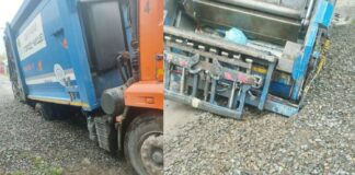 В Новосибирске 20-тонный мусоровоз провалился в присыпанную щебнем яму на дороге